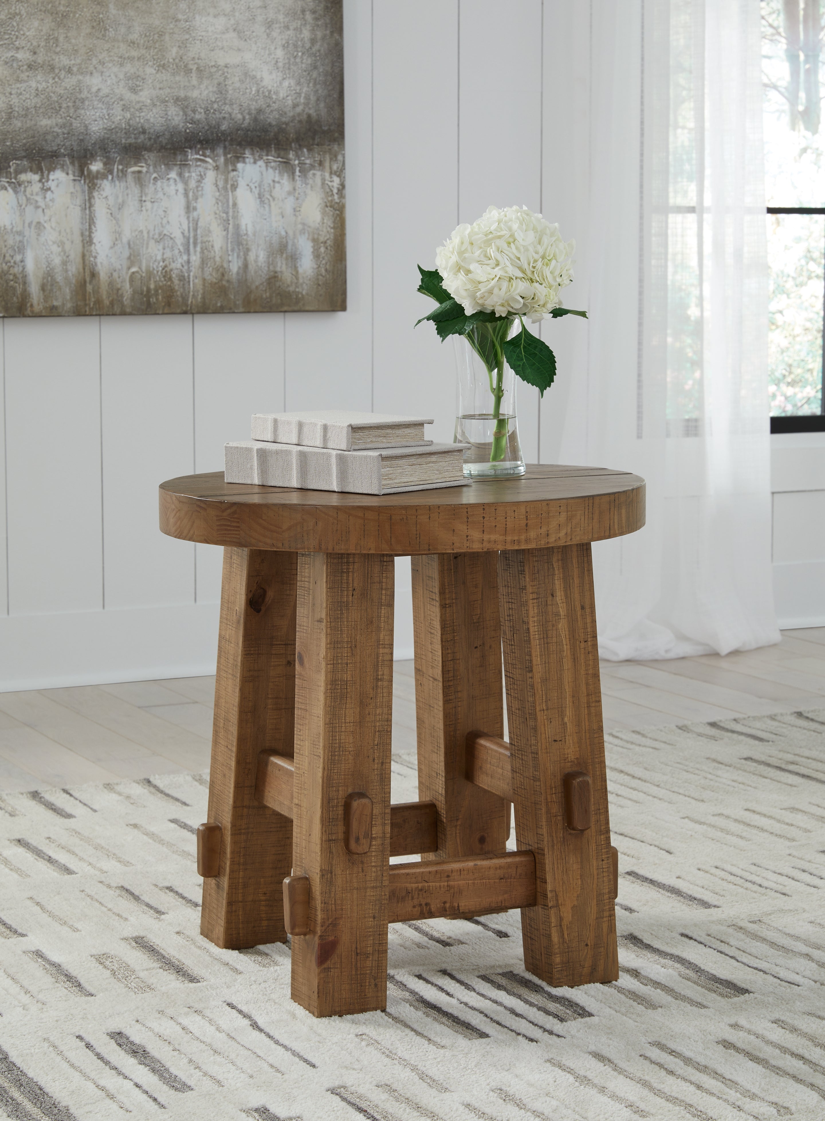 Bay Furniture Gallery - Ashley Furniture - Mackifeld End Table - Round End Table / Warm Brown - T724-6