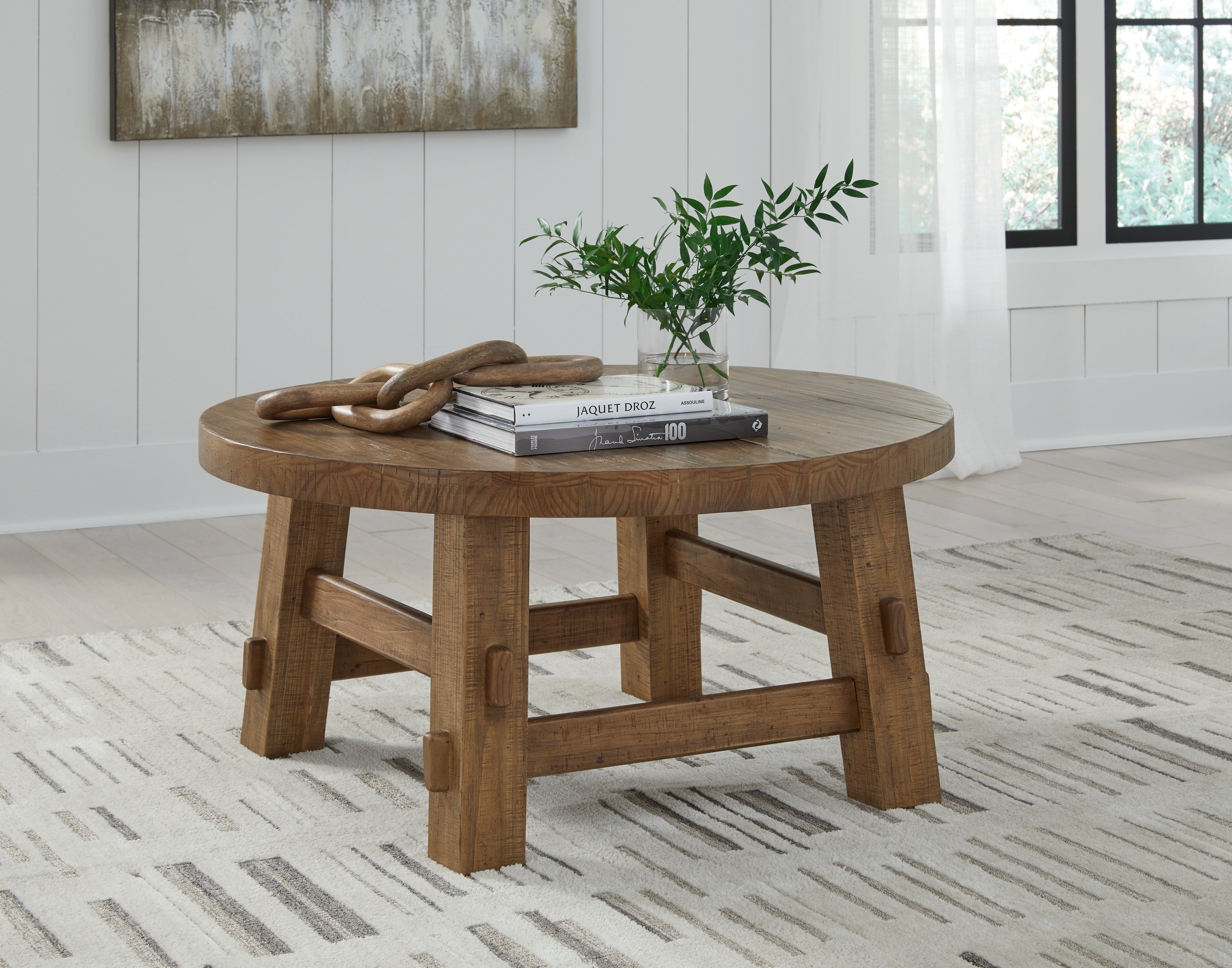 Bay Furniture Gallery - Ashley Furniture - Mackifeld Coffee Table - Round Cocktail Table / Warm Brown - T724-8