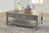 Bay Furniture Gallery - Ashley Furniture - Charina Coffee Table - Rectangular Cocktail Table / Antique Gray - T784-1