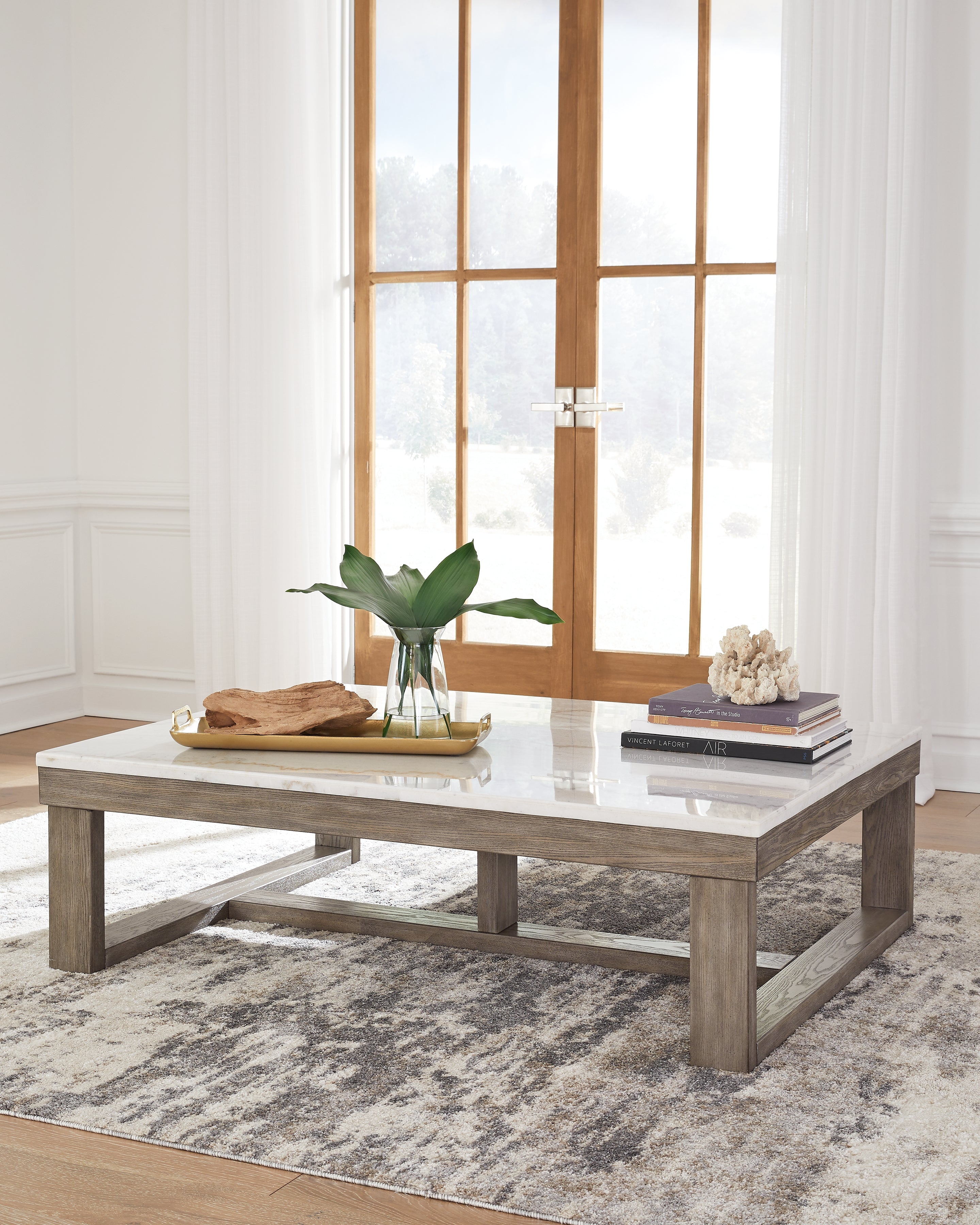Bay Furniture Gallery - Ashley Furniture - Loyaska Coffee Table - Rectangular Cocktail Table / Brown/Ivory - T789-1