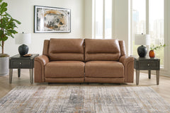 Bay Furniture Gallery - Ashley Furniture - Trasimeno Living Room - 2 Seat PWR REC Sofa ADJ HDREST / Caramel - U8281547