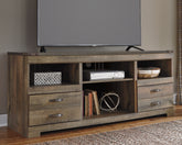 Bay Furniture Gallery - Ashley Furniture - Trinell TV Stand - 63" / Brown - W446-68