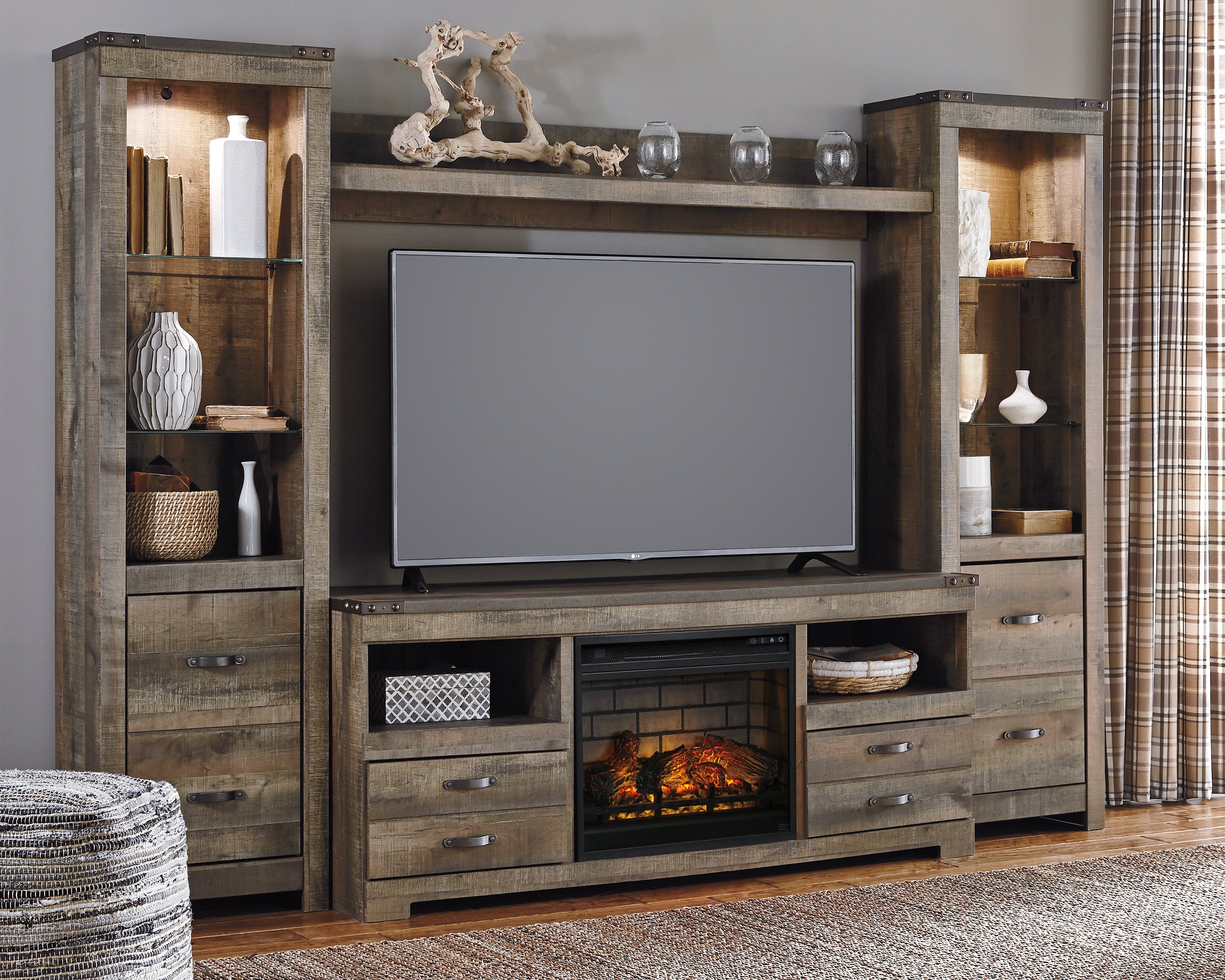 Bay Furniture Gallery - Ashley Furniture - Trinell 4-Piece Entertainment Center with Electric Fireplace - 4-Piece Entertainment Center with Electric Fireplace / Brown - W446W8