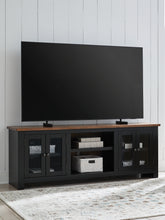 Bay Furniture Gallery - Ashley Furniture - Wildenauer 76" TV Stand - 76" / Brown/Black - W664-68
