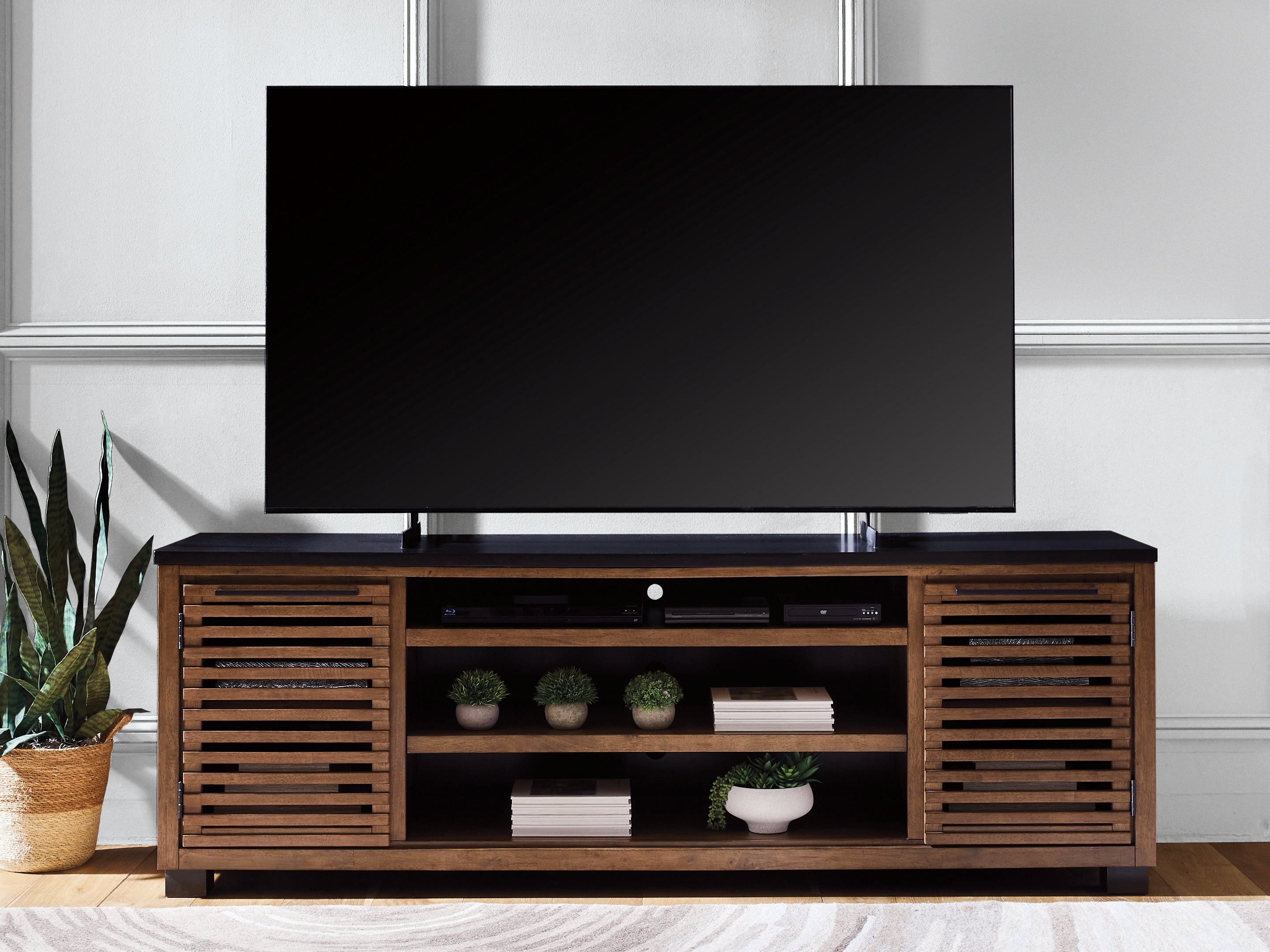 Bay Furniture Gallery - Ashley Furniture - Kallari 84" TV Stand - 84" / Warm Brown/Black - W737-78