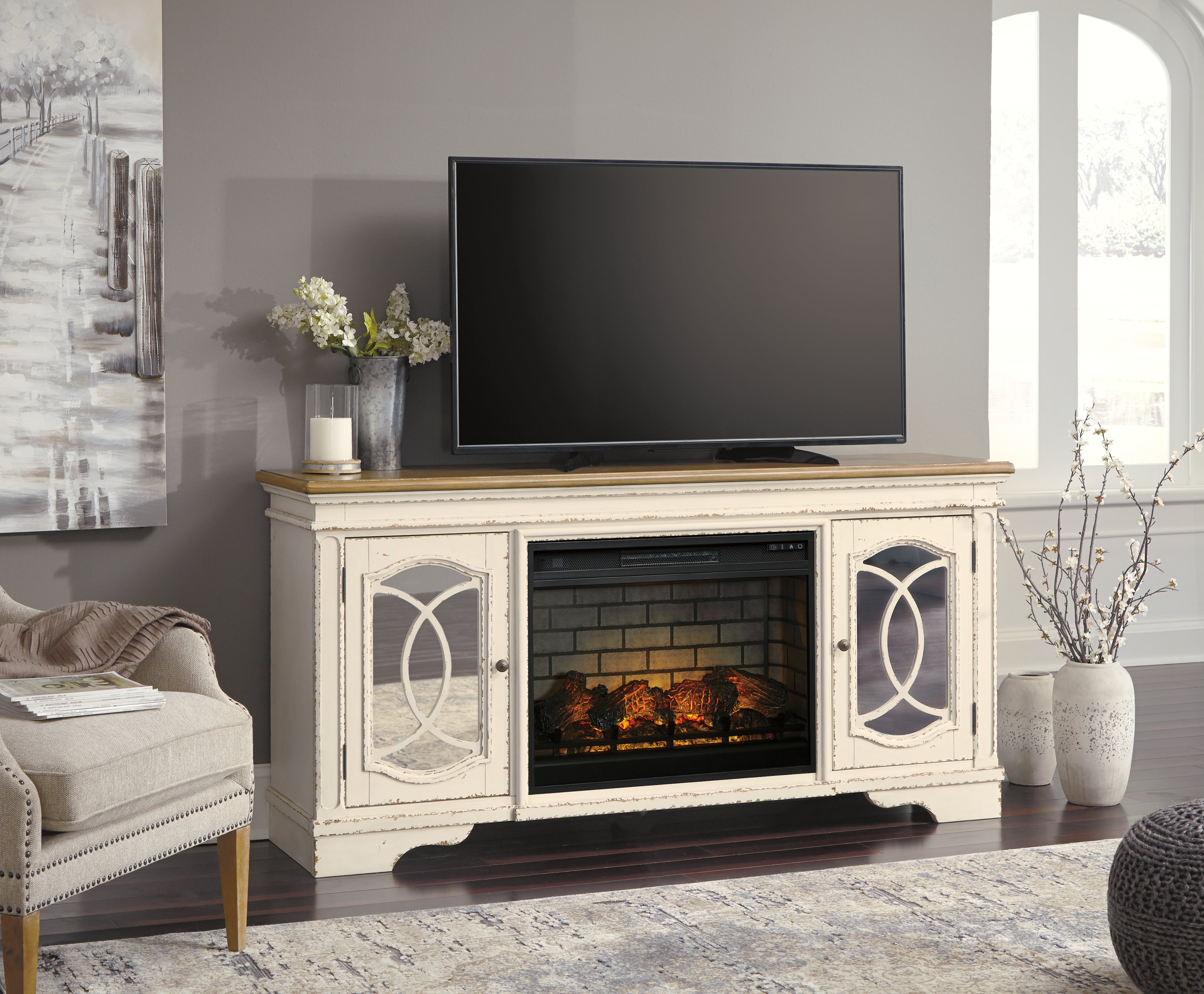 Bay Furniture Gallery - Ashley Furniture - Realyn 74" TV Stand with Electric Fireplace - 74" TV Stand with Electric Fireplace / Chipped White - W743W2