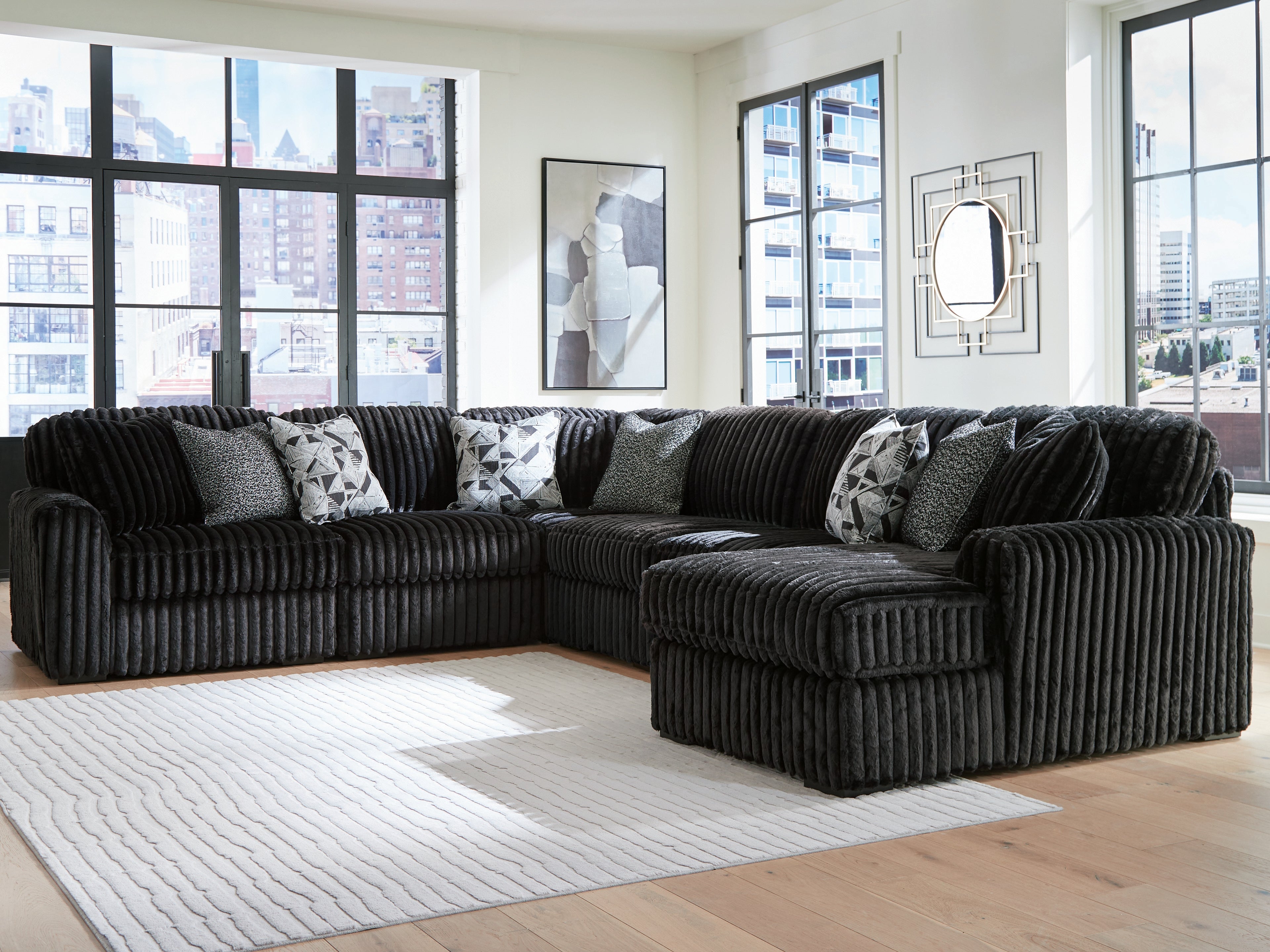 Bay Furniture Gallery - Ashley Furniture - Midnight-Madness Sectional - RAF 6-Piece Sectional with Chaise / Onyx - 98103S24