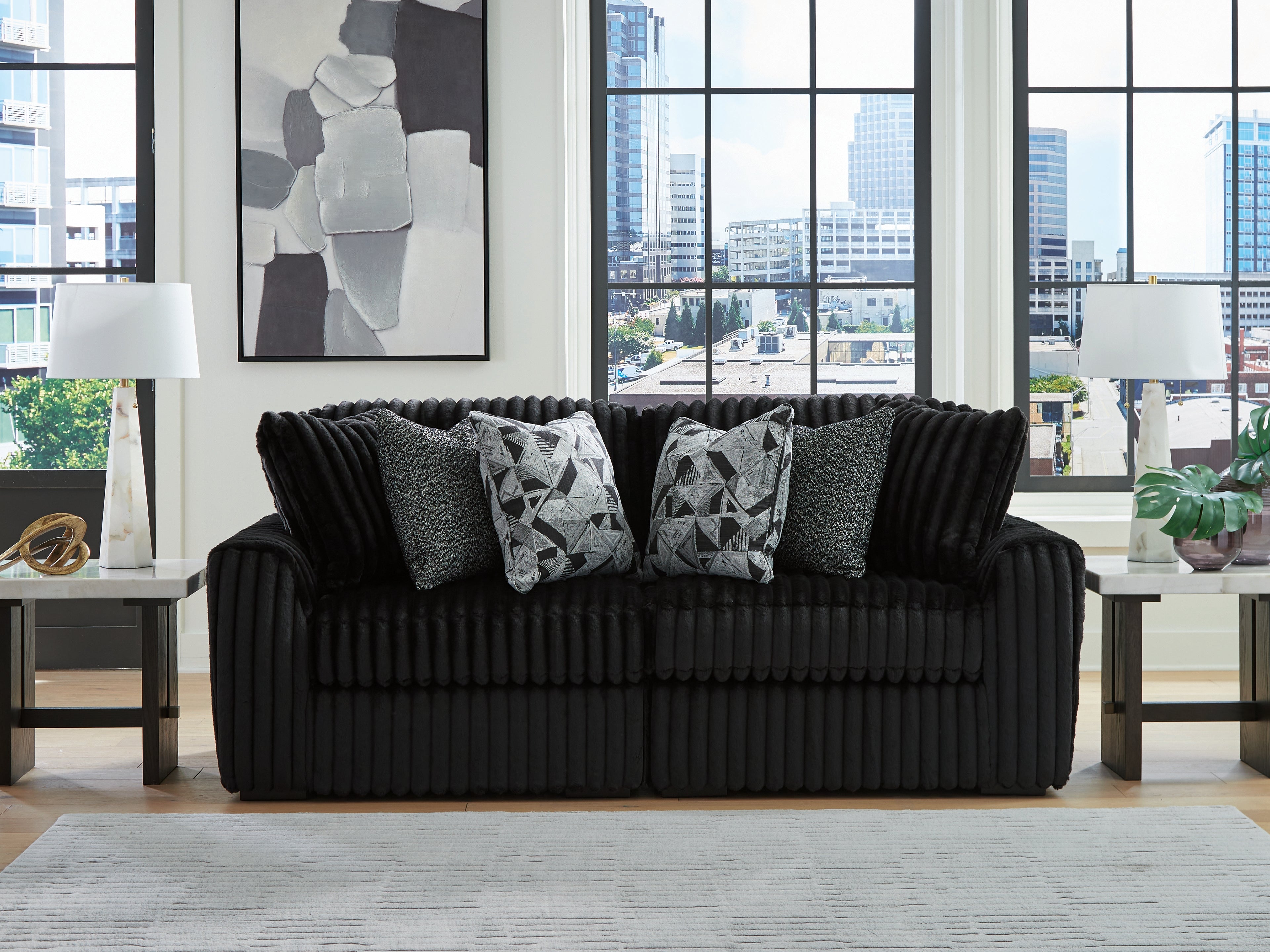 Bay Furniture Gallery - Ashley Furniture - Midnight-Madness Sectional - RAF 2-Piece Sectional Sofa / Onyx - 98103S11