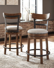 Bay Furniture Gallery - Ashley Furniture - Valebeck Dining Room - UPH Swivel Stool (1/CN) / Black - D546-824