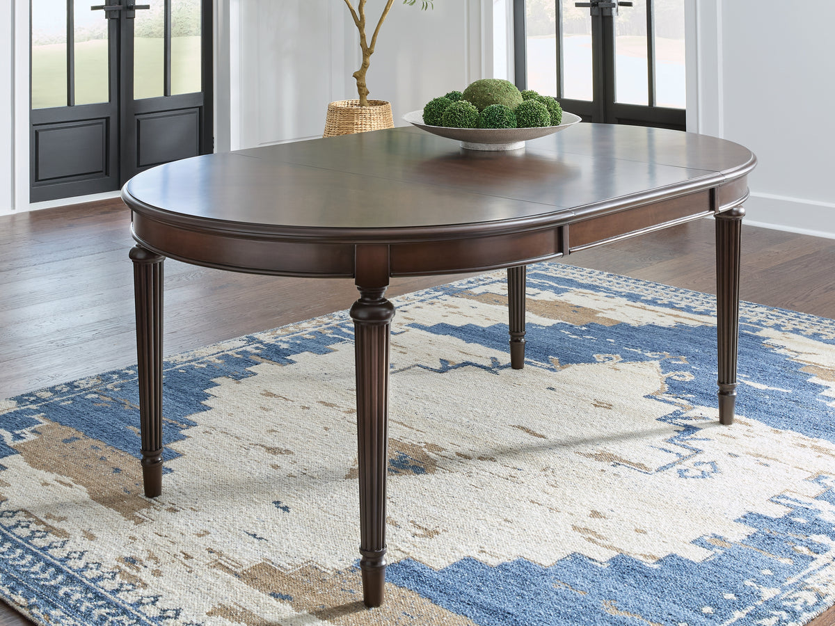 Bay Furniture Gallery - Ashley Furniture - Lavinton Dining Room - Oval Dining Room EXT Table / Brown - D764-35