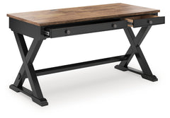 Bay Furniture Gallery - Ashley Furniture - Wildenauer Office Desk - Home Office Desk / Brown/Black - H664-34