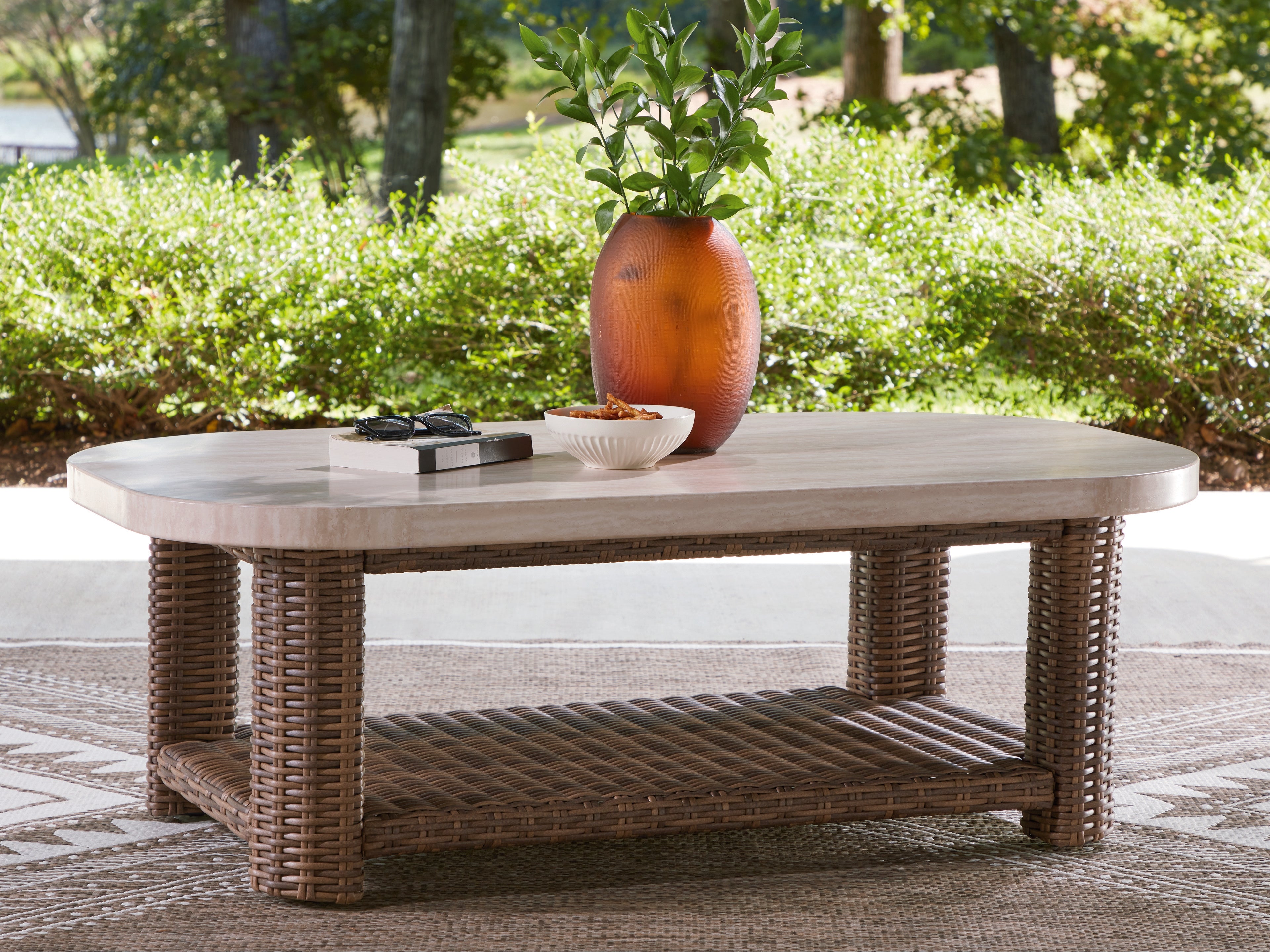 Bay Furniture Gallery - Ashley Furniture - Dolan Creek Outdoor - Rectangular Cocktail Table / Beige/Brown - PCP610-701
