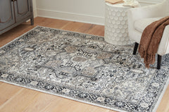 Bay Furniture Gallery - Ashley Furniture - Gregmoore Rug - 5'2" x 6'10" Washable Rug / Multi - R405822