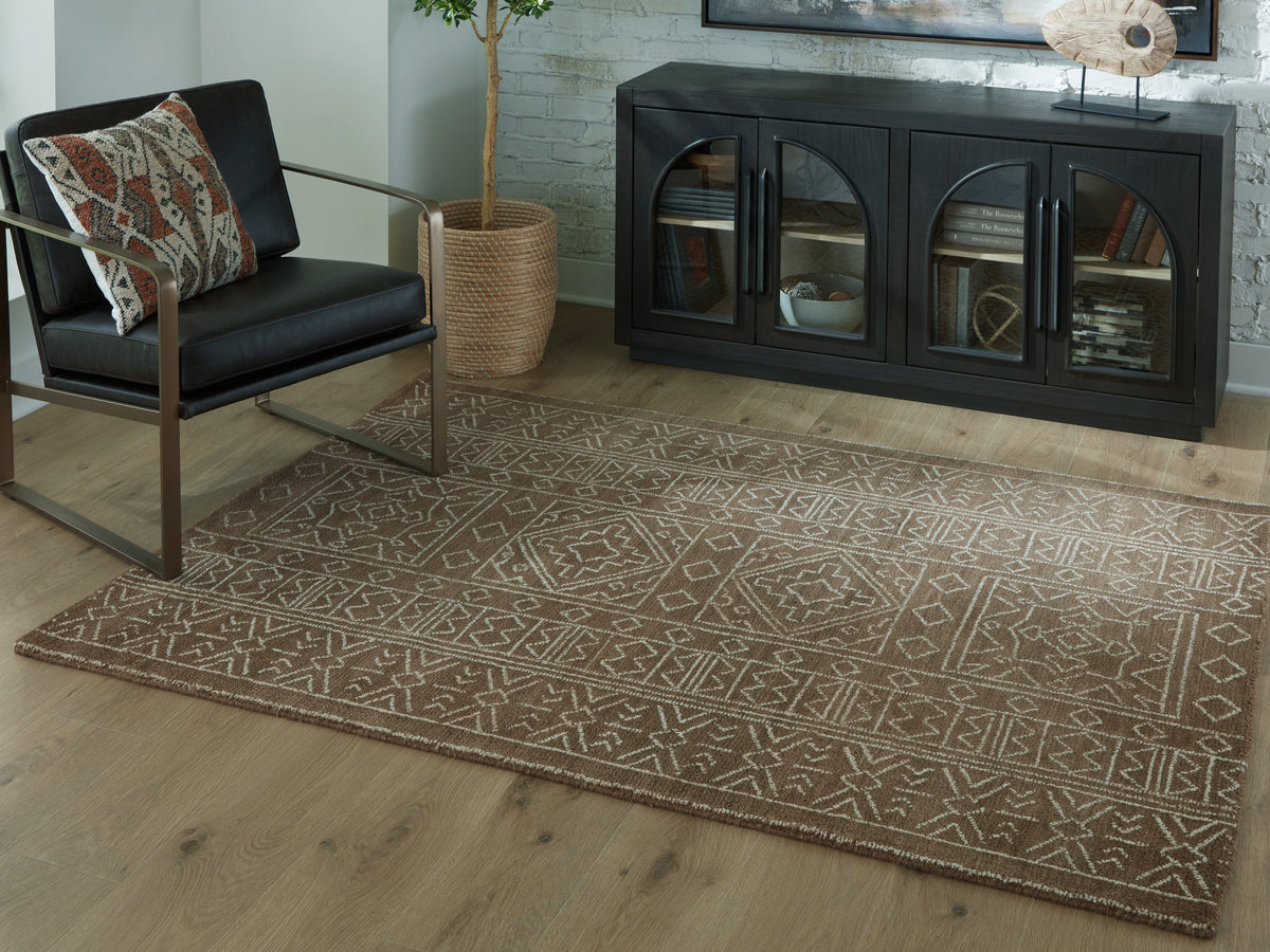 Bay Furniture Gallery - Ashley Furniture - Merrittman Rug - 5' x 7' Area Rug / Brown/Ivory - R407702