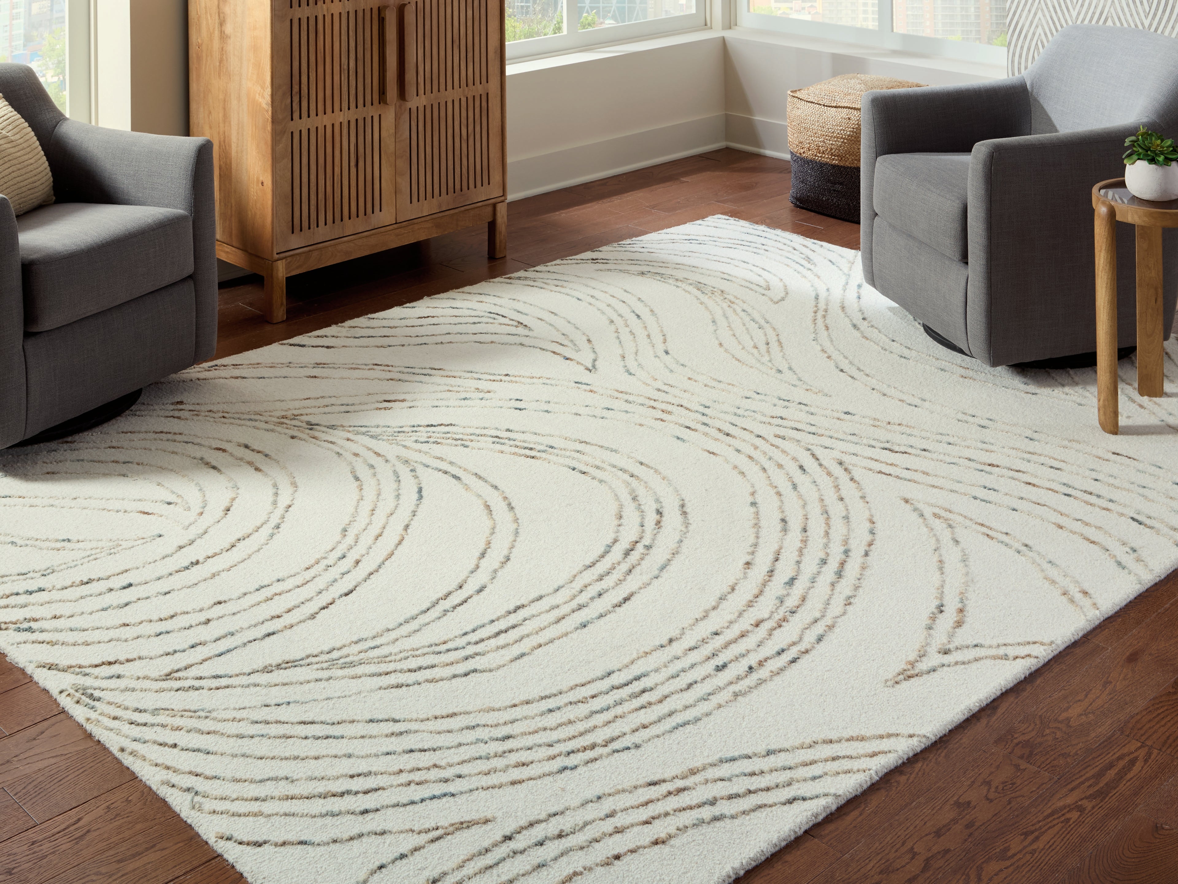 Bay Furniture Gallery - Ashley Furniture - Deenbury Rug - 7'8" x 10' Area Rug / Ivory/Green/Brown - R407861