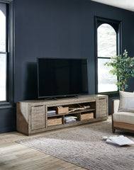 Bay Furniture Gallery - Ashley Furniture - Krystanza 92" TV Stand - 92" / Weathered Gray - W760-78